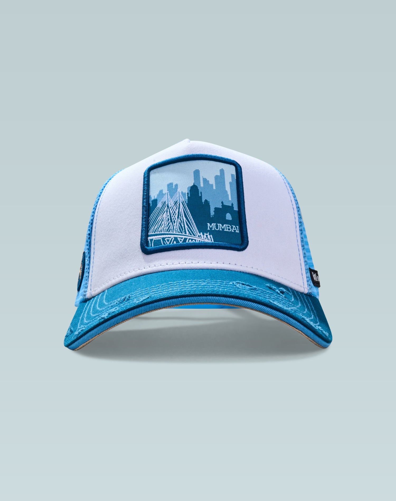 The City of Dreams White and Blue Cotton Trucker Cap